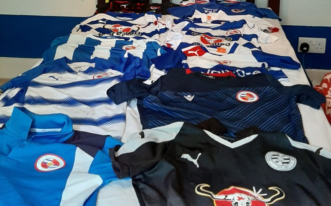 a collection of football shirts