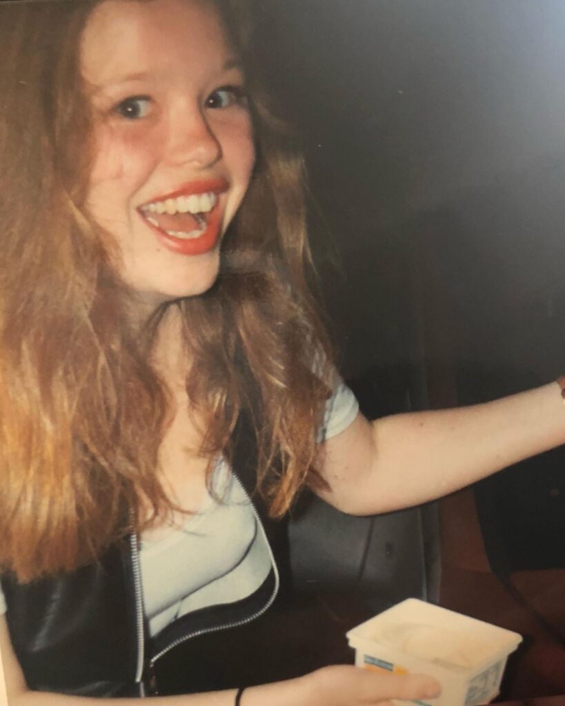 Toni as a teenager - she is smiling mischievously