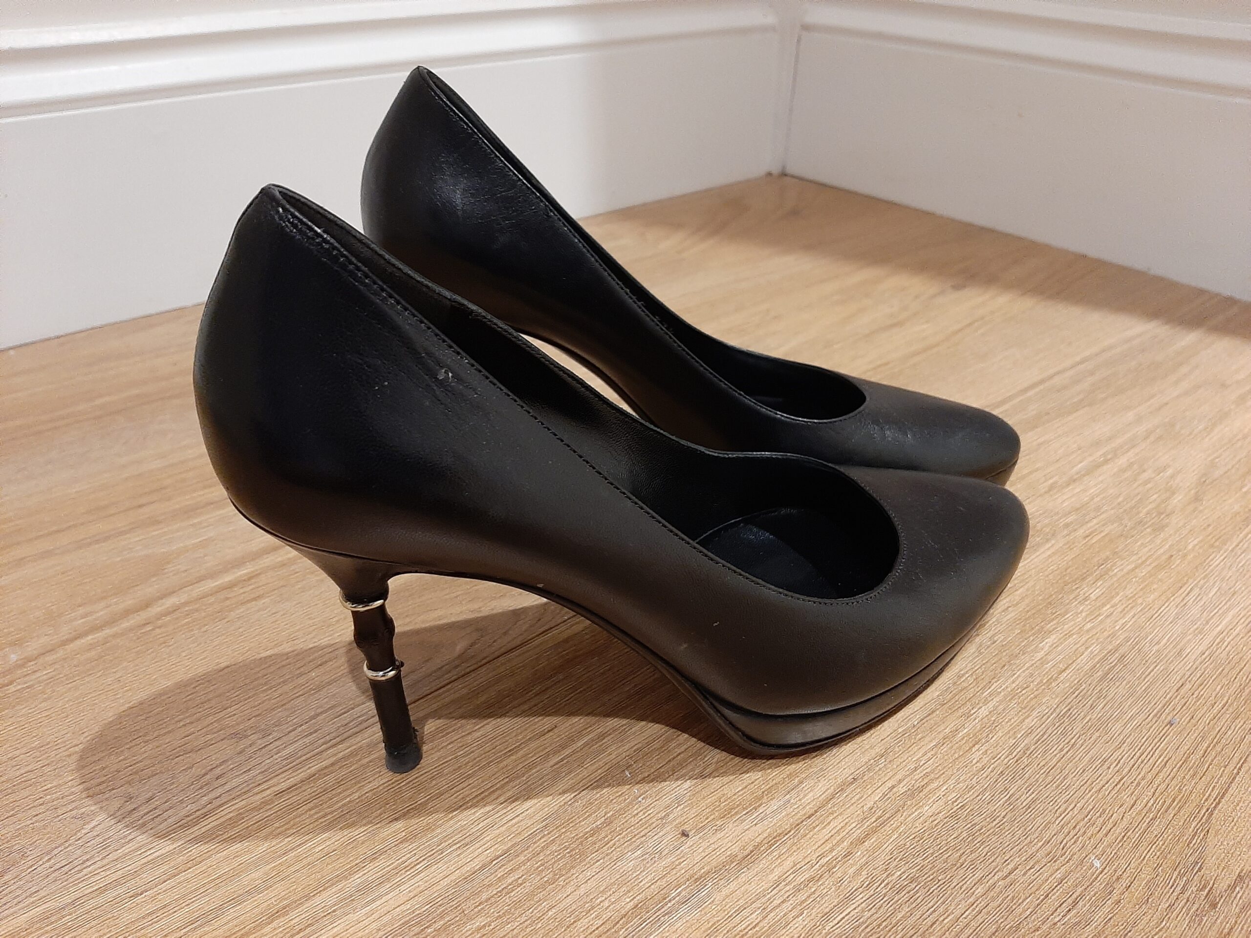 a pair of black Gucci pumps - social mobility in action!